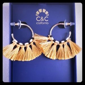 Black gold and white earrings